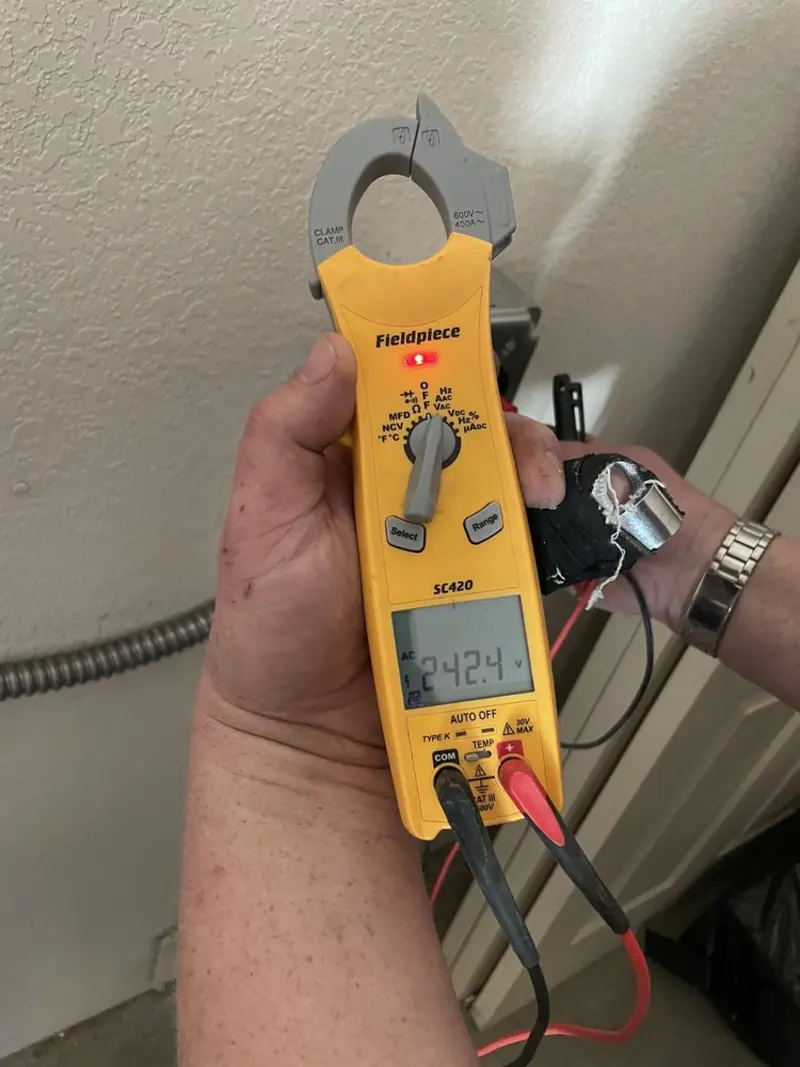 Voltage testing with clamp meter during Aluminum Wiring Replacement in South Lyon